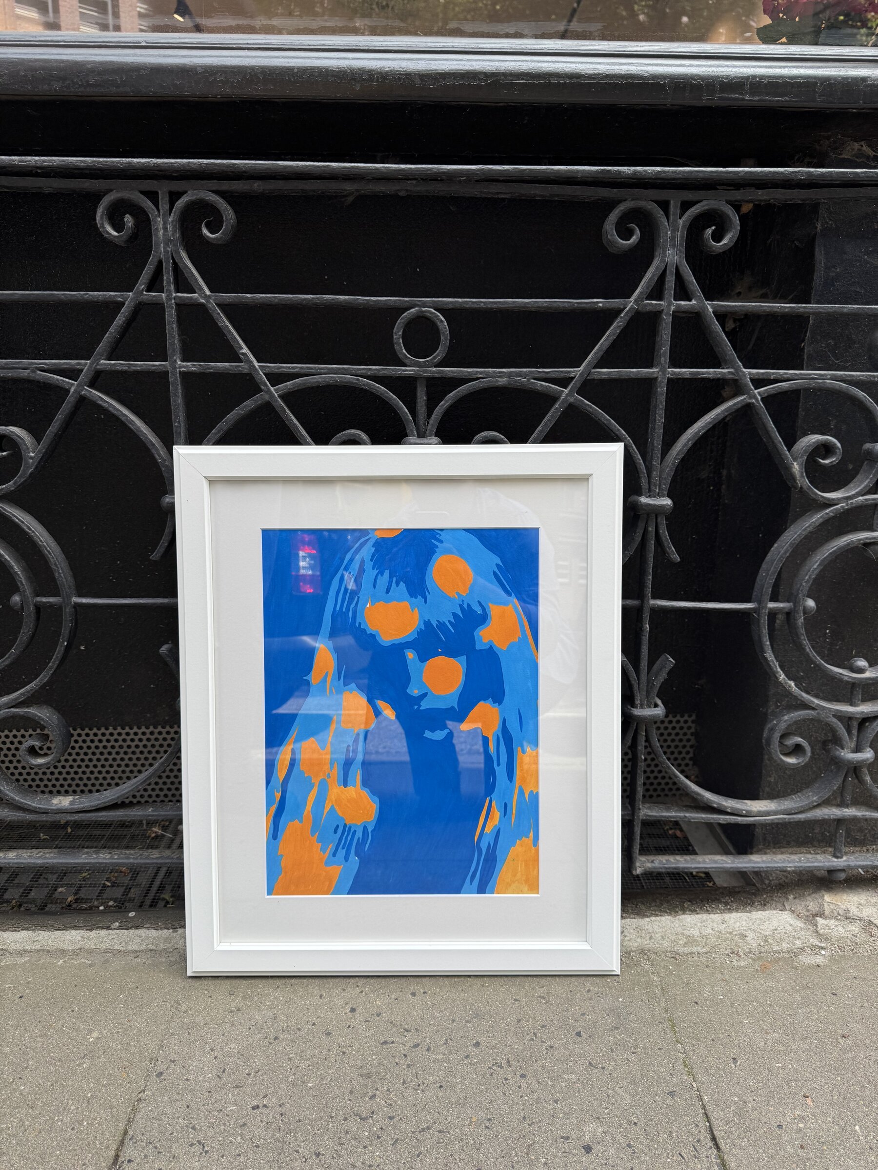 Darina Mikityuk, framed painting in blue and orange