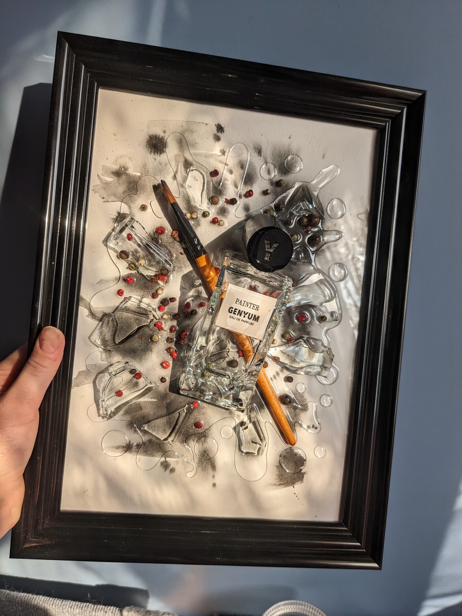 Assemblage work by Ida, with a Genyum perfume bottle