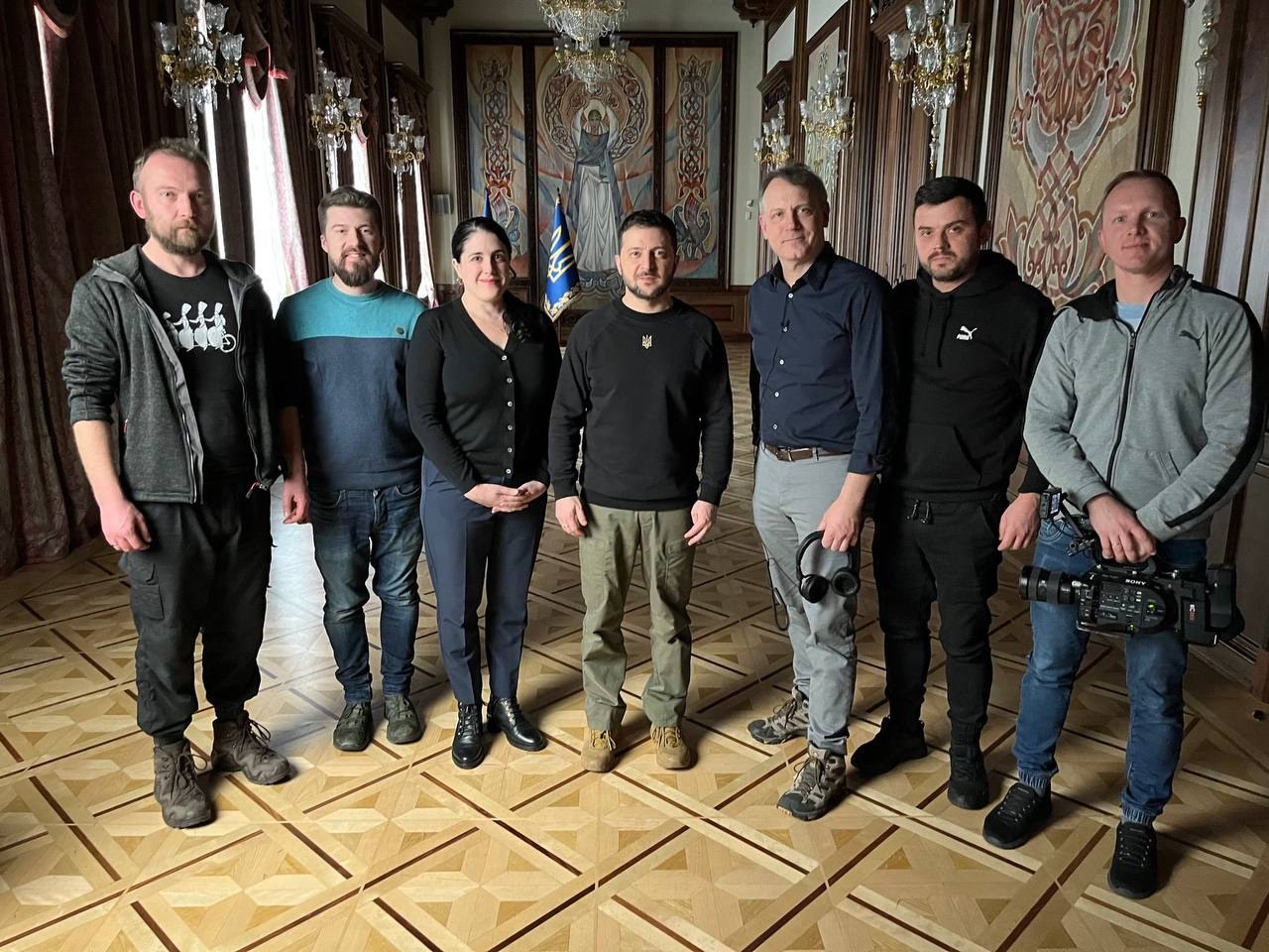 Maksym Tuzhylin's crew with President Volodymyr Zelensky on the set of Netflix's Turning Point
